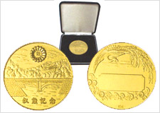 純金記念メダル